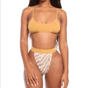 Tan bikini with zebra bottoms